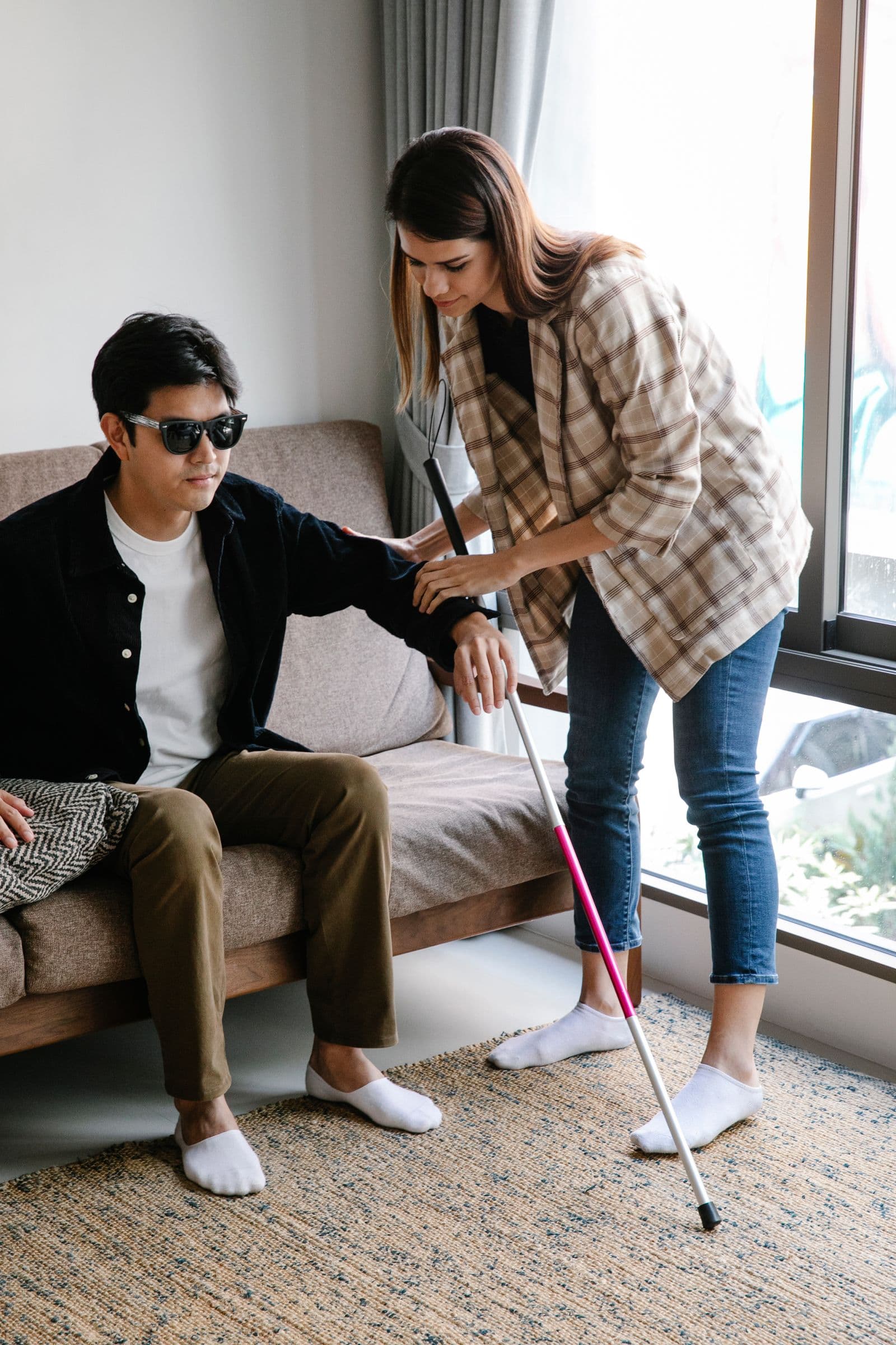 Friendly First Priority Care support worker providing compassionate NDIS care